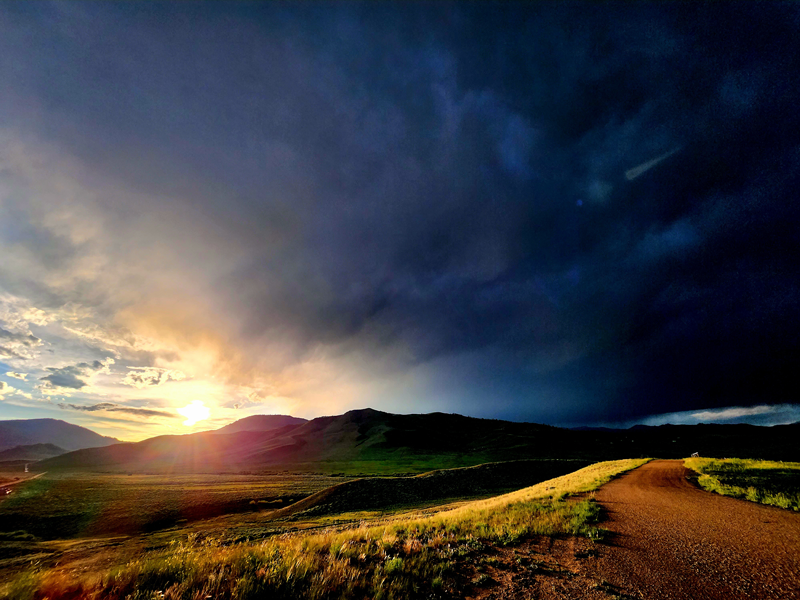 Beautiful sunset on Cottonwood Pass in Colorado just after a huge thunderstorm passed. it was epic, Thomas...you should have seen it. Dark blues and purples against a golden dirt road and yellow wildflowers in green summer pastures with the sun gleaming through the clouds and I almost got struck by lightening taking these photos, Thomas, it was very dangerous.
